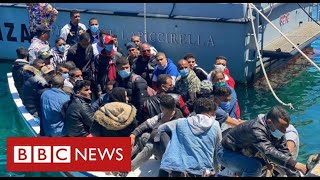 Italy warns of new migrant surge with “tens of thousands” planning to cross from Libya  BBC News [upl. by Ekihc]